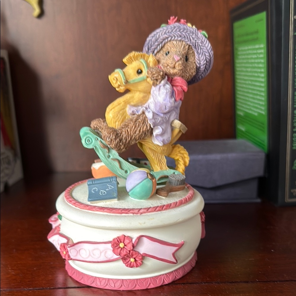 Charming Bear Figurine with Hat and Rocking Horse